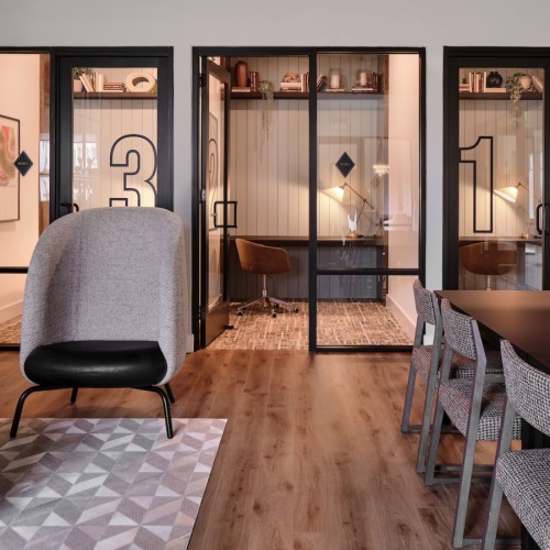 Access to resident-only features a community room with seating and tables